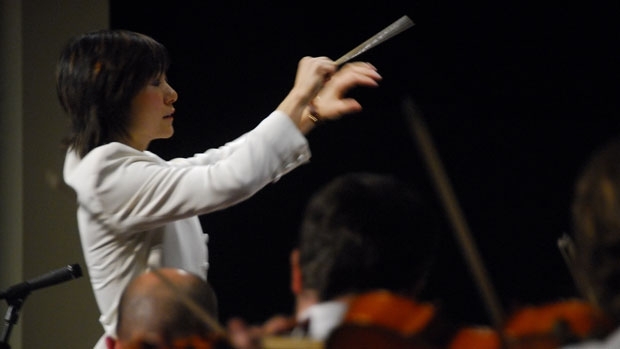 A person conducting an orchestra