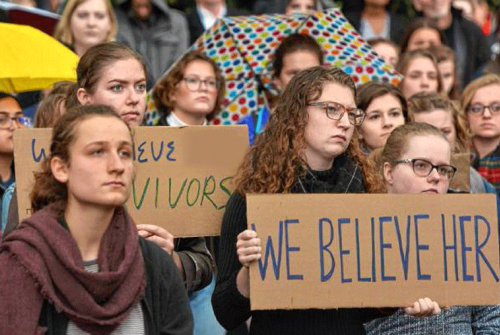 Students standing in solidarity during the MeToo movement