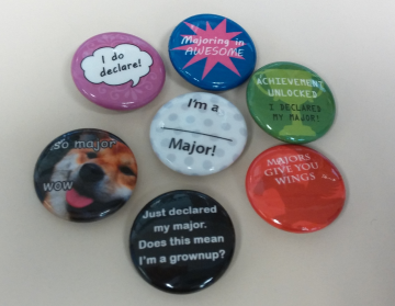 Buttons with sayings on them about selecting a major, such as "I do declare" and "I just declared my major! Does that mean I'm a grown up?" 