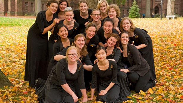A group of singers in the fall leaves