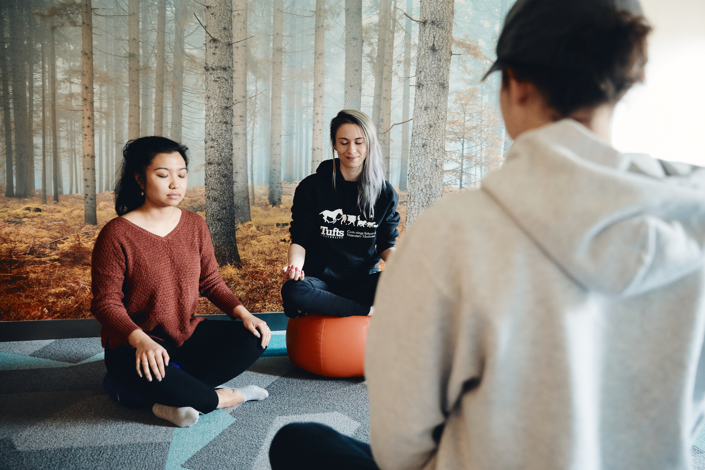 Students meditating in the Moasis space