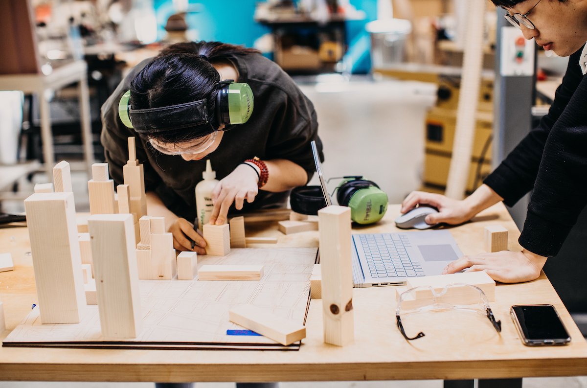 A student works on a wood project in the Fimbel Lab