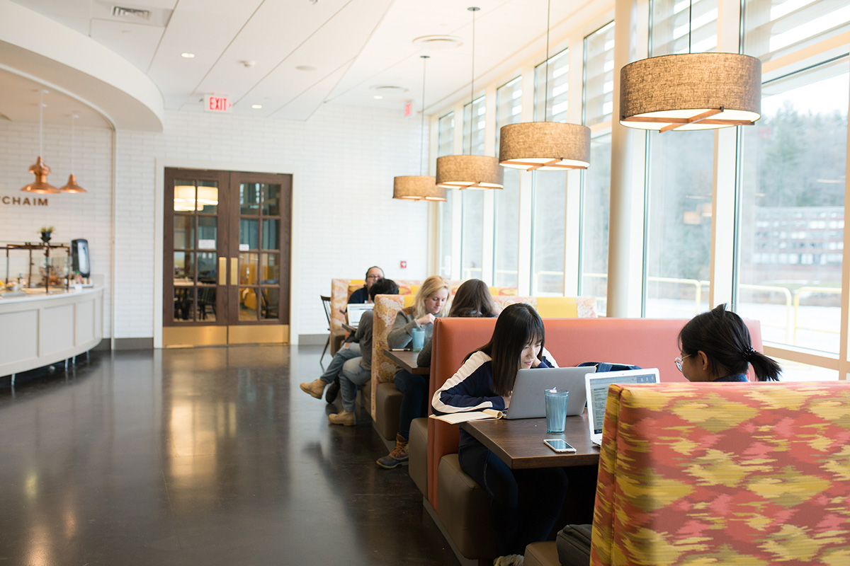 Dine with us at Mount Holyoke College - our dining room with students sitting at the tables