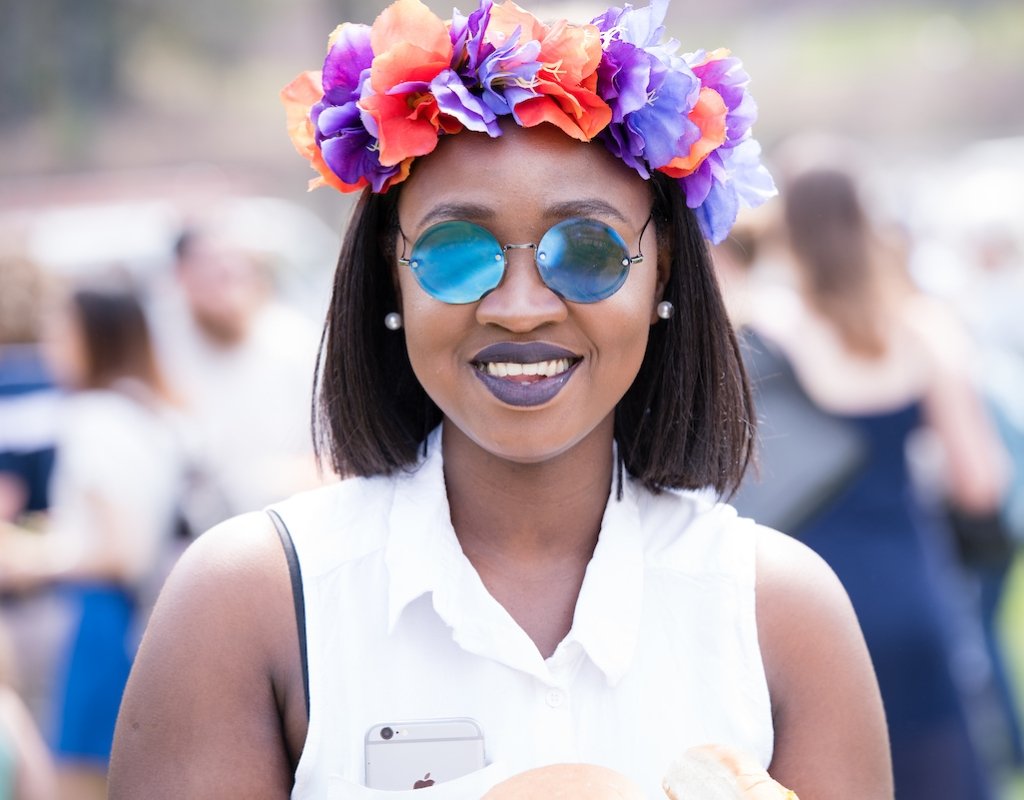A student wearing a flower crown on Pangy Day