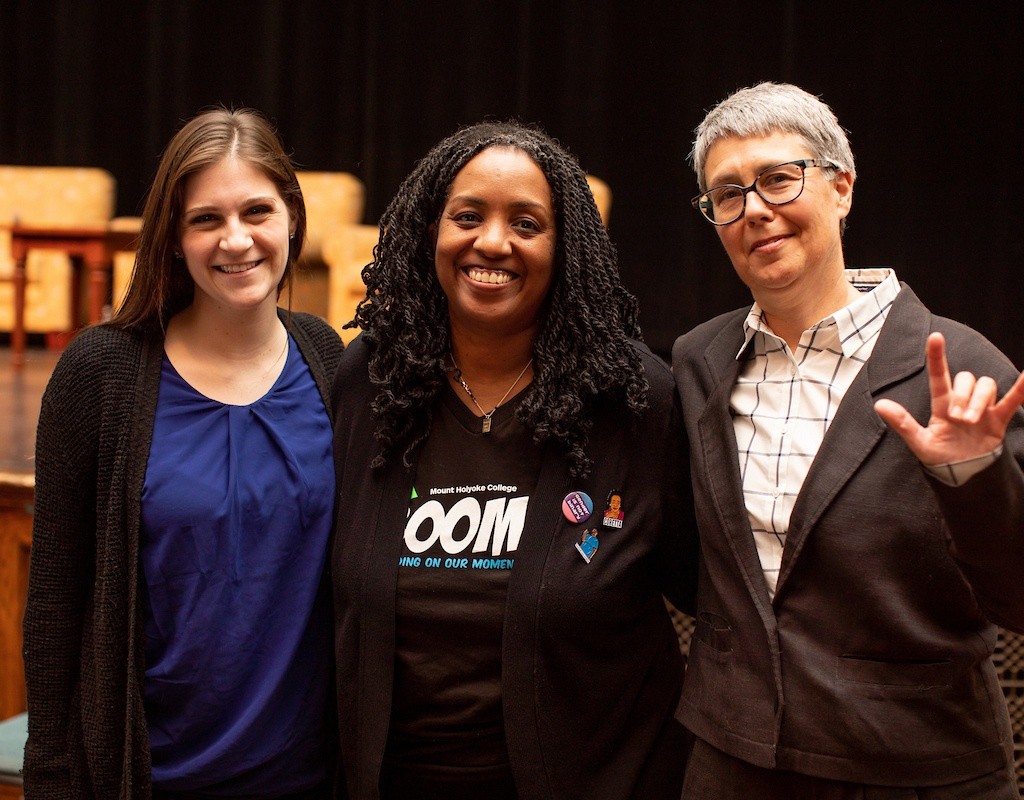 Kijua Sanders-McMurtry poses with BOOM attendees, 2019.