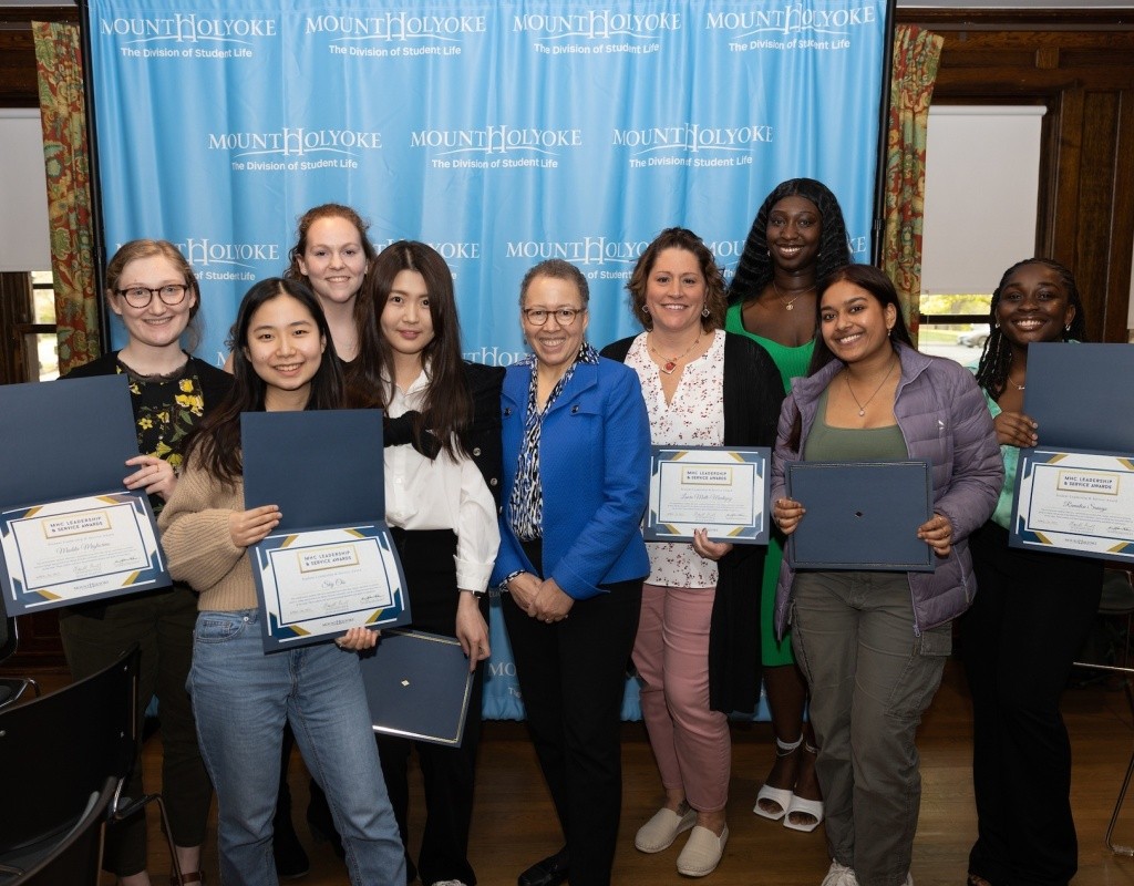 Award recipients pose for a photo with Dr. Beverly Daniel Tatum