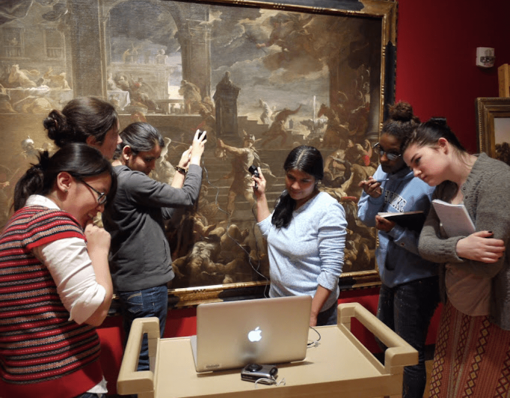 Students using infra-red imaging to look under paintings in the Mount Holyoke Art Musseum