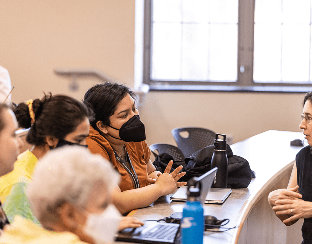 MWCE Climate Justice Summit guests in discussion.