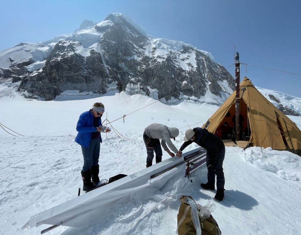 Bridget Hall ’24 and team processing a core from the glacier.