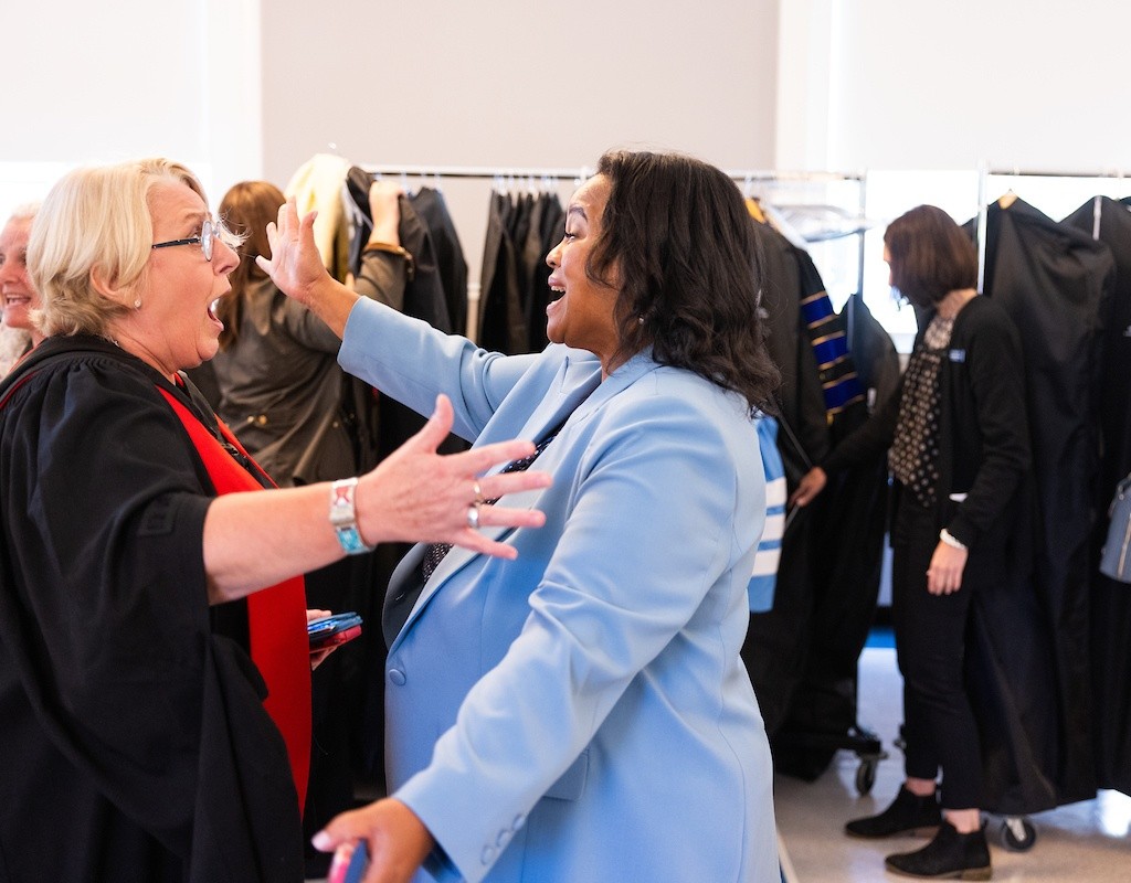 Danielle Holley greeting Sonya Stephens
