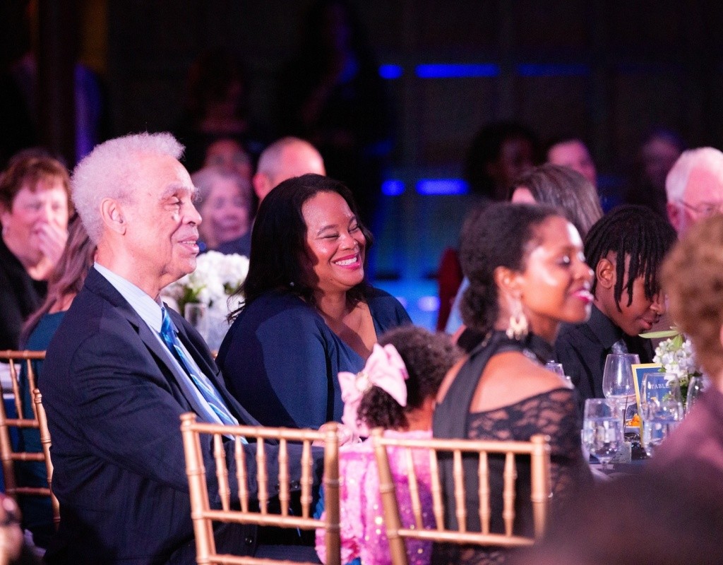 President Danielle R. Holley smiling during a dinner in Chapin