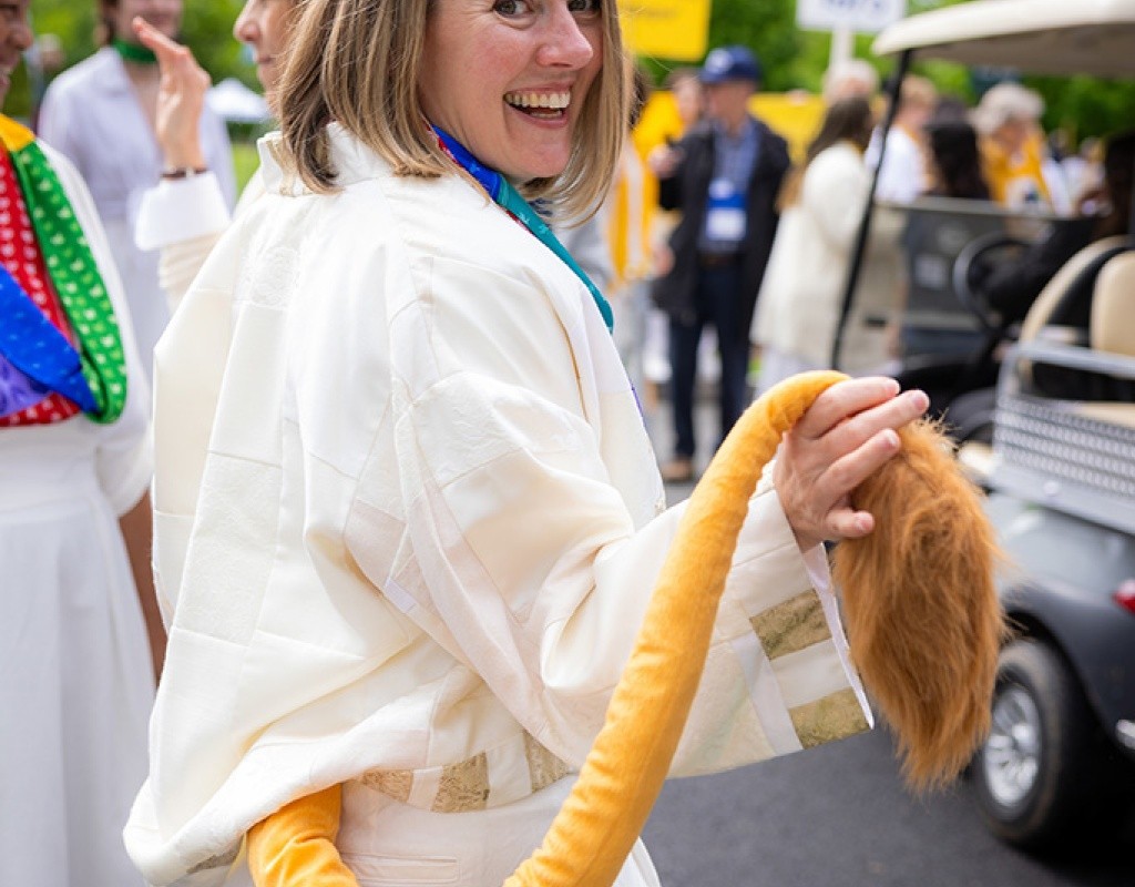 Holding up Paws' tail