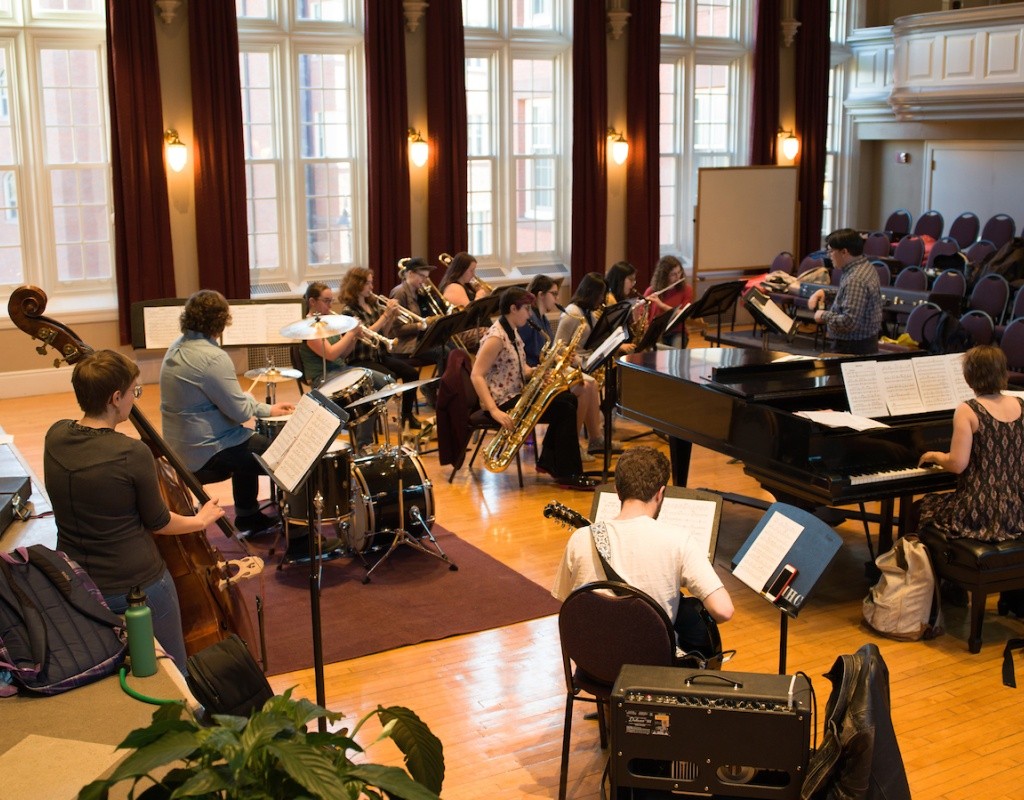 The jazz ensemble rehearing in McCulloch Auditorium in Pratt Hall