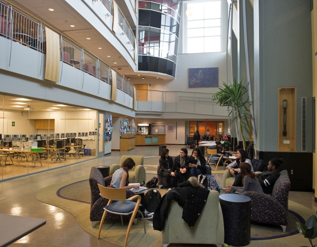 Students hanging out in the Kendade atrium