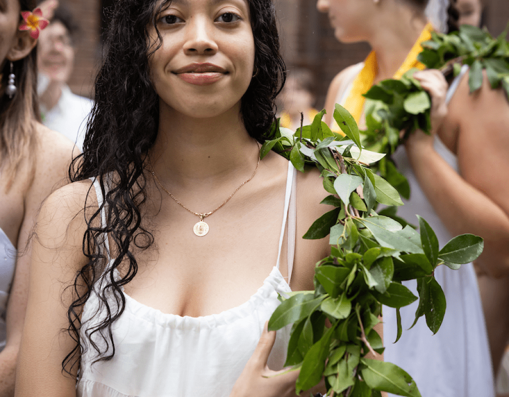 A student with the laurel drain draped over their shoulder during the Laurel Parade 2023