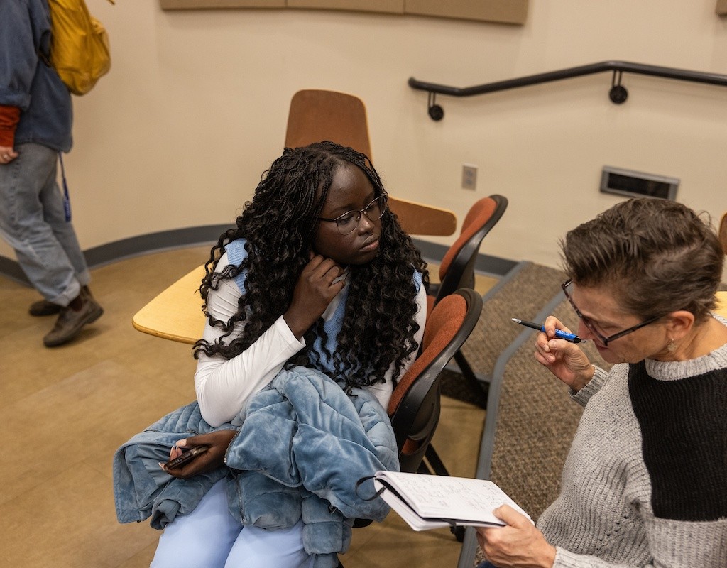 Students discussing at LEAP Symposium 2023