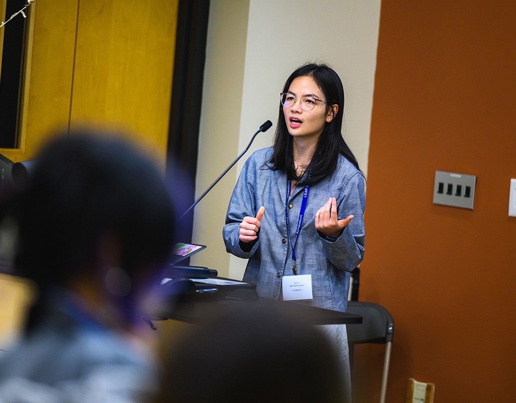 Presenter speaking at Mount Holyoke College's LEAP Symposium, October 2024
