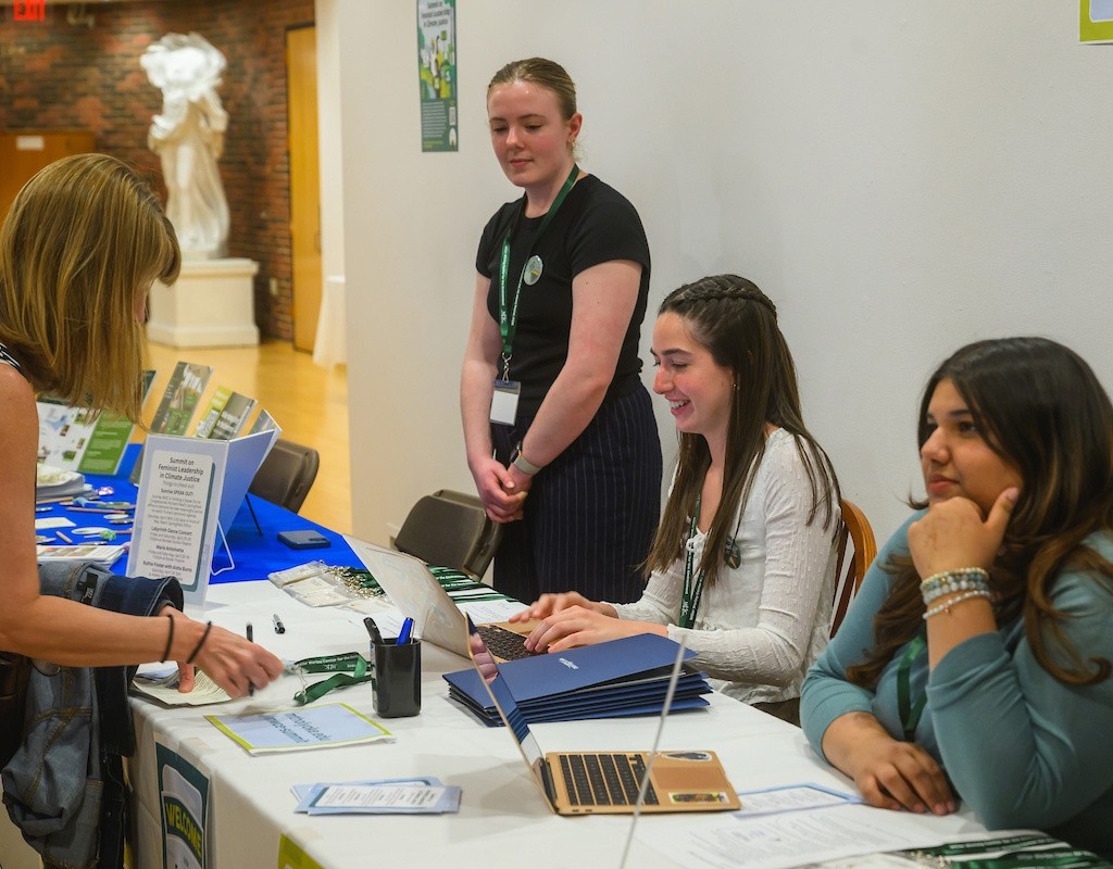 Information table at the Summit on Feminist Leadership in Climate Justice held at Mount Holyoke College on April 25, 2025