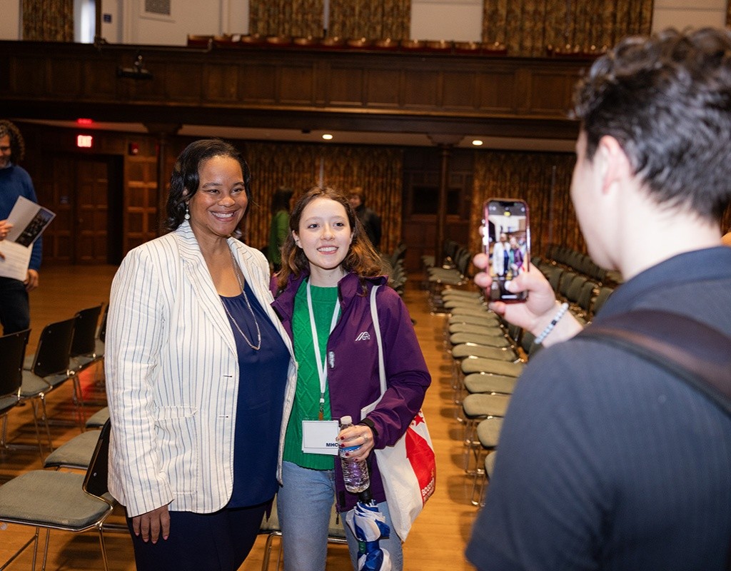 President Holley has photo taken with prospective student at Experience MHC! April 5, 2025, Photo by Jo Chattman.