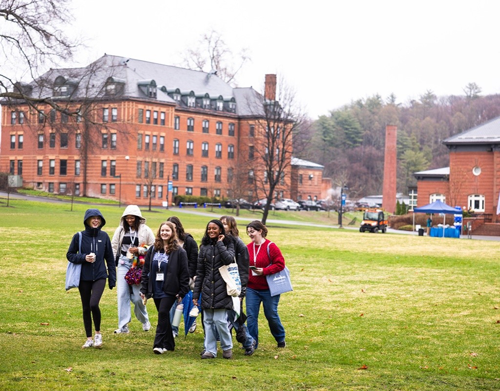Experience MHC! prospective students walking across Skinner Green. April 5, 2025 photo by Jo Chattman.