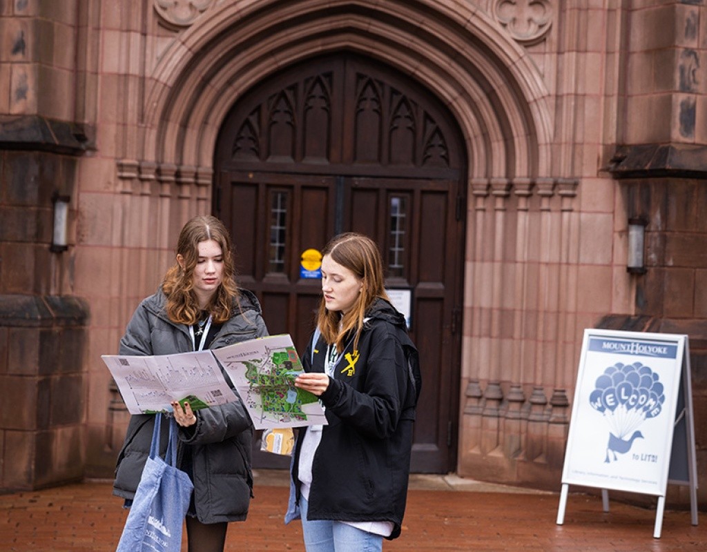 Experience MHC! participants review the map in front of Williston Library on April 5, 2025, Photo by Jo Chattman.