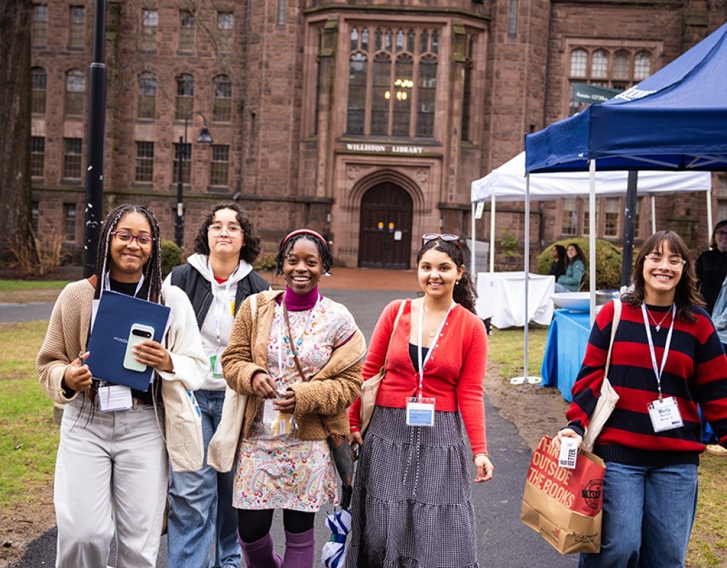 Experience MHC! participants walking across campus from the library on April 5, 2025, Photo by Jo Chattman.