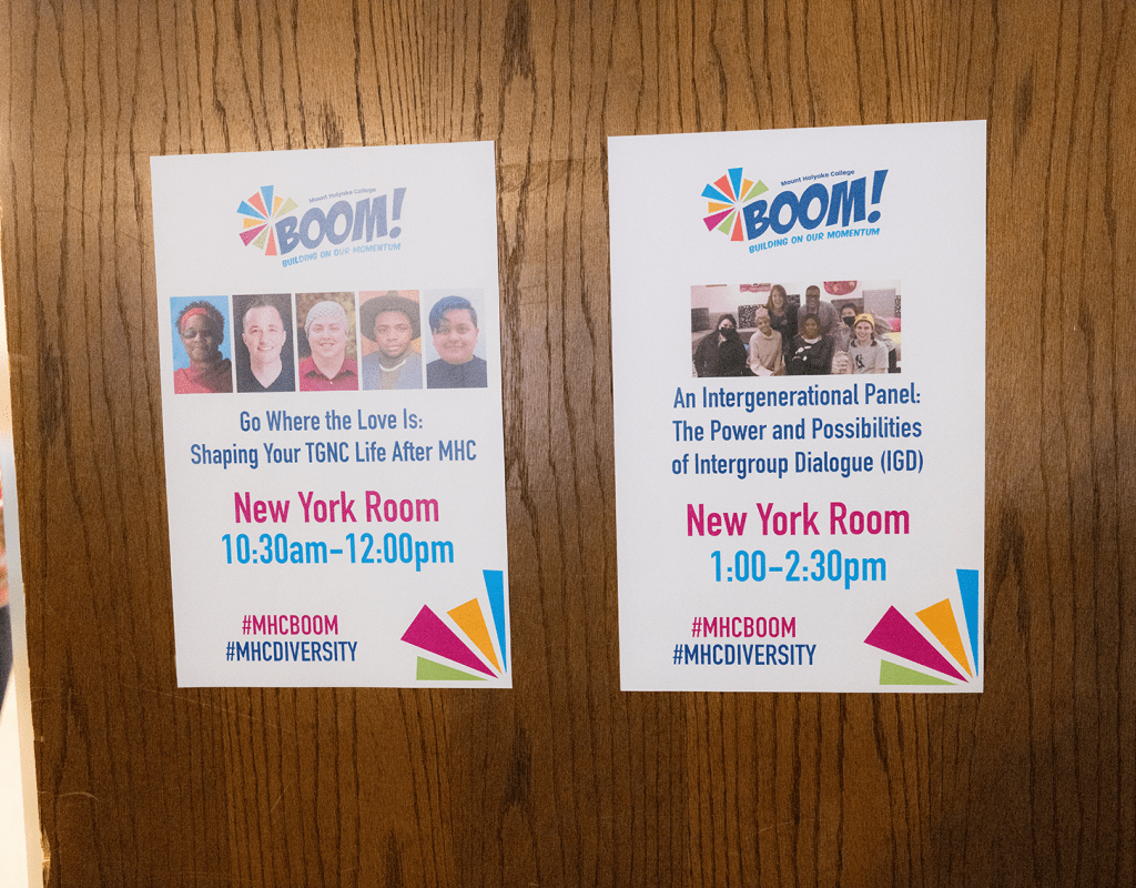 Signs on a doorway introducing the sessions that took place during the 2023 BOOM! Learning Symposium