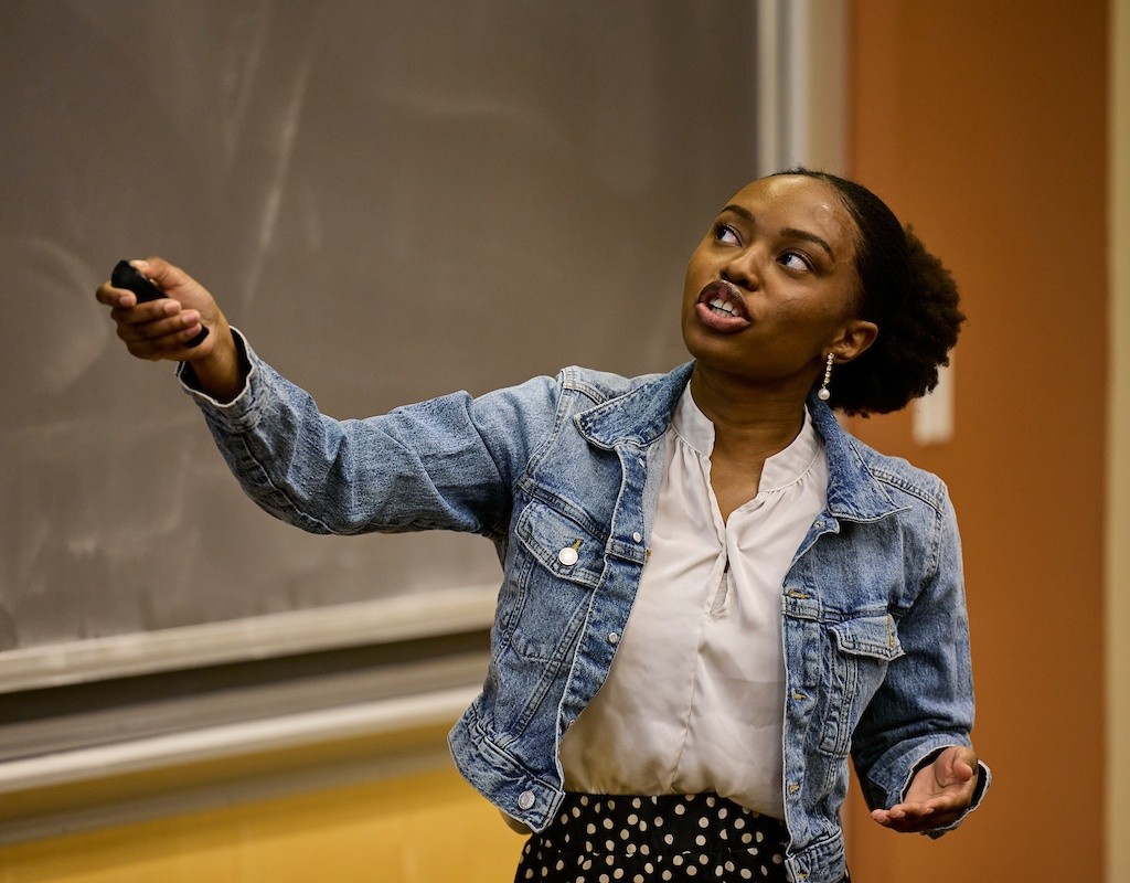 Mount Holyoke College | Senior Symposium 2024 - A 2024 graduate giving a presentation of their research