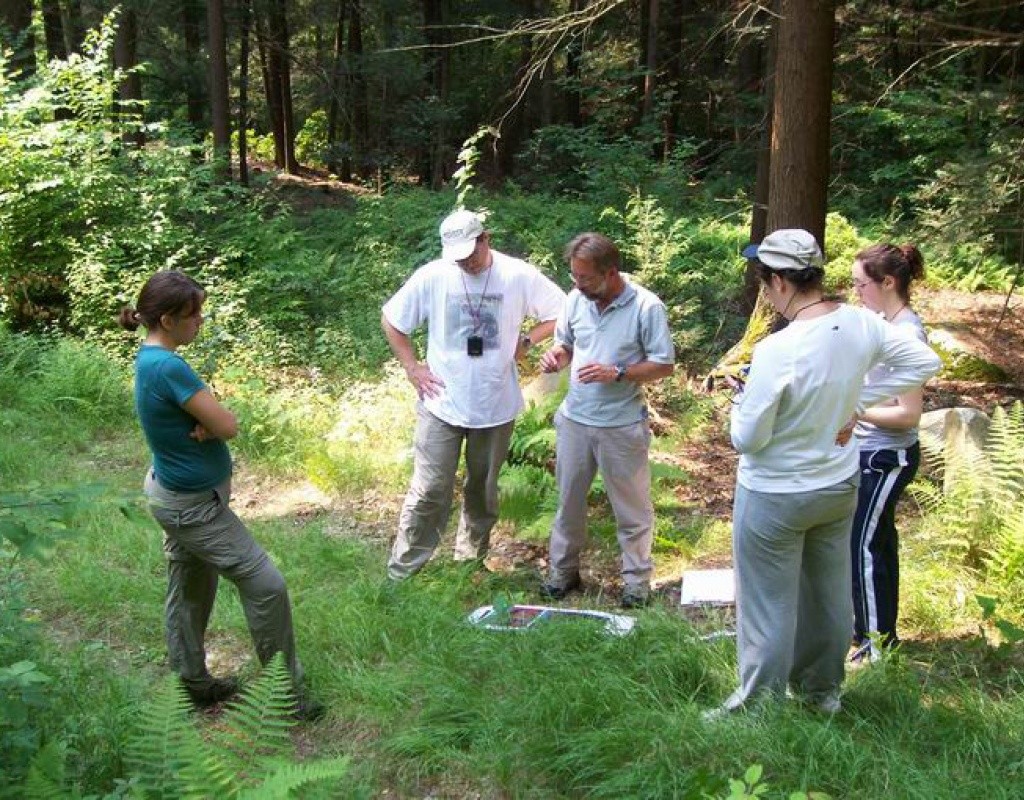Dr. Millette and Dr. Orwig from Harvard Forest working with students at Quabbin Reservoir.