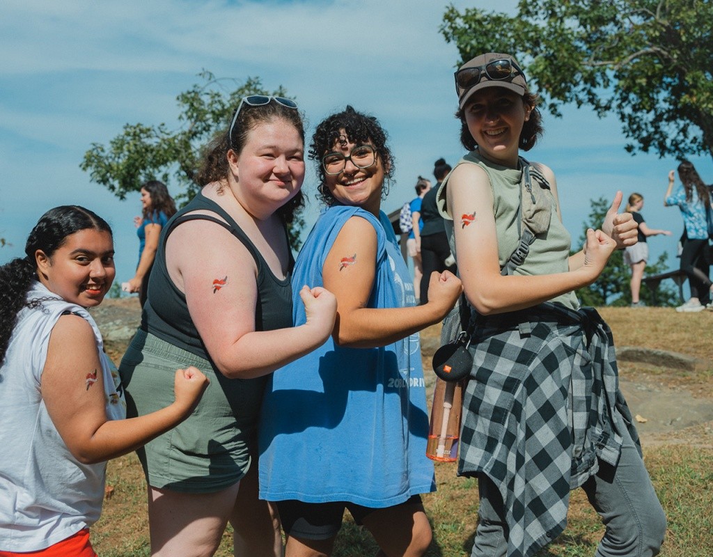 Mountain Day 2024 - Students pose with their temporary tattoos.