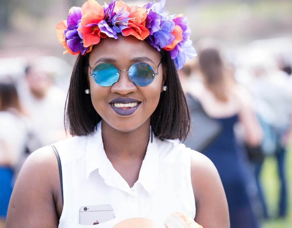 A student wearing a flower crown on Pangy Day