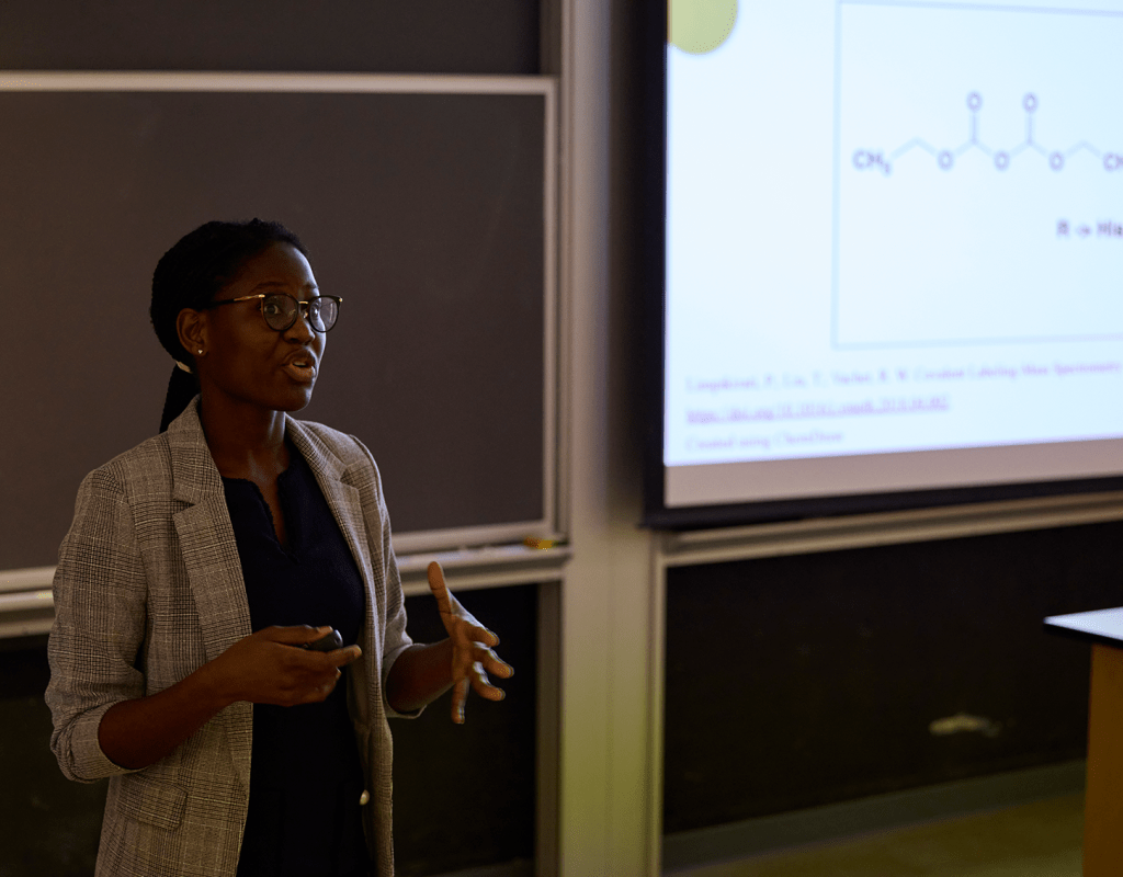 A student addresses the audience during Senior Symposium 2023