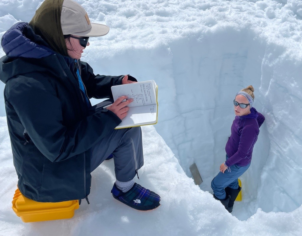 Bridget Hall ’24 and team snow density sampling.