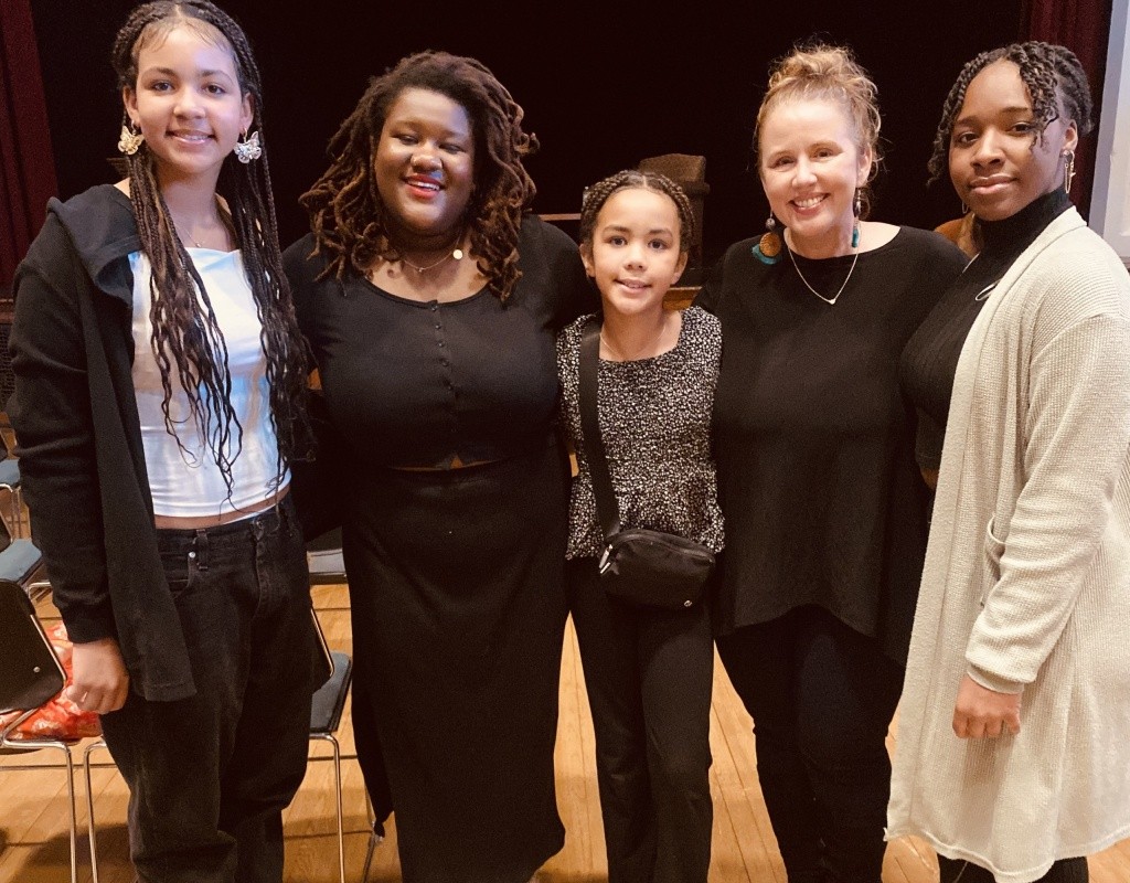 Marcella Runnell poses with attendees at TOCLC.