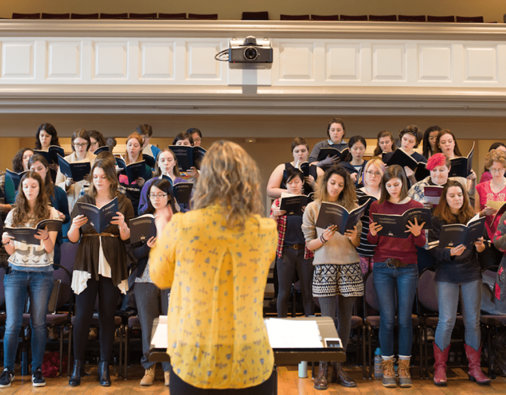 A vocal ensemble rehearsing