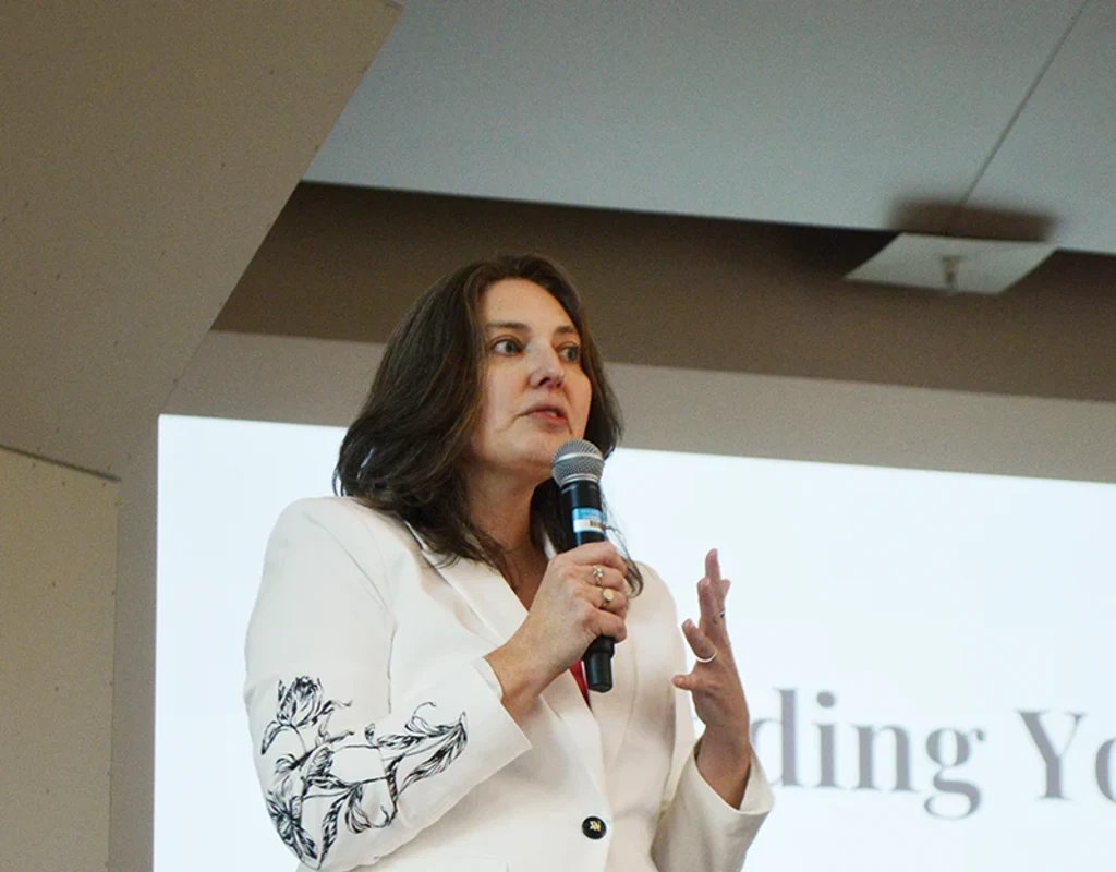 Keynote speaker Lauren Duffy ’03, CEO of UMass Five Credit Union, addresses conference attendees.