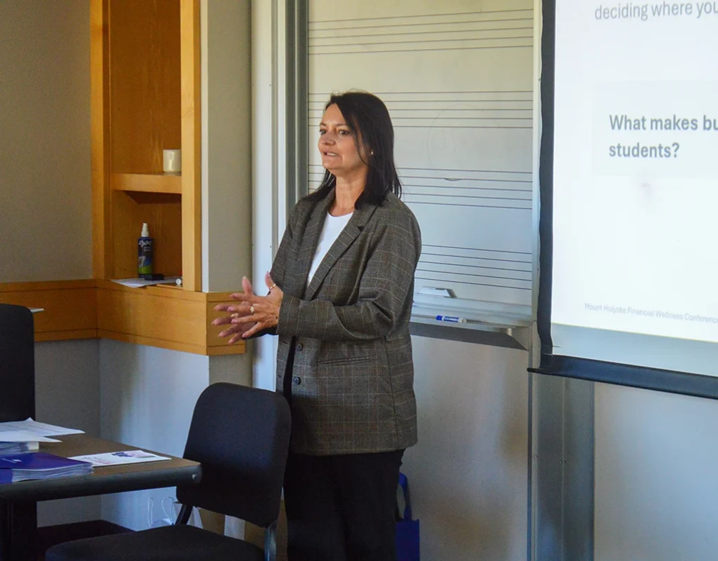 Katarzyna Bernash from PeoplesBank talks with student attendees about budgeting basics and financial goal setting during the Money &amp; Mindfulness conference.