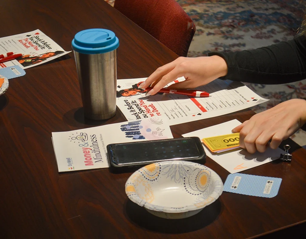Students participate in an interactive exercise illustrating the benefits of budgeting.