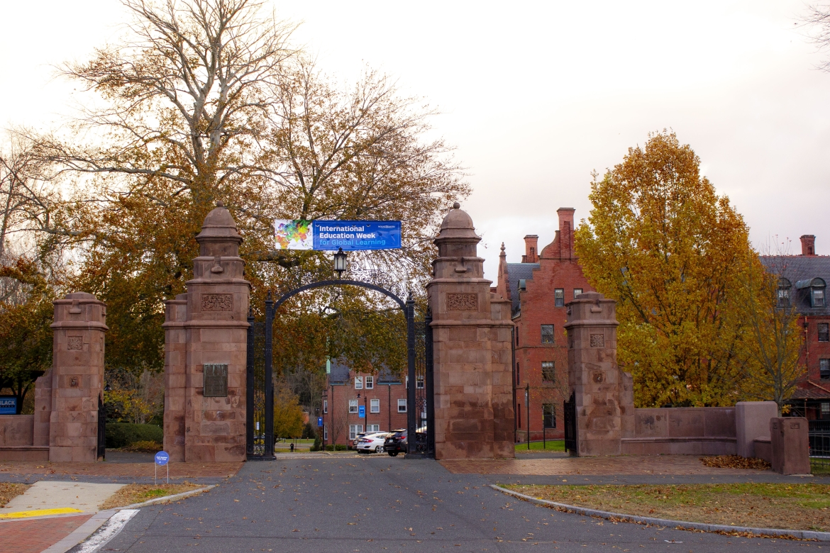 Mount Holyoke College's Gates draped with a banner celebrating International Education Week