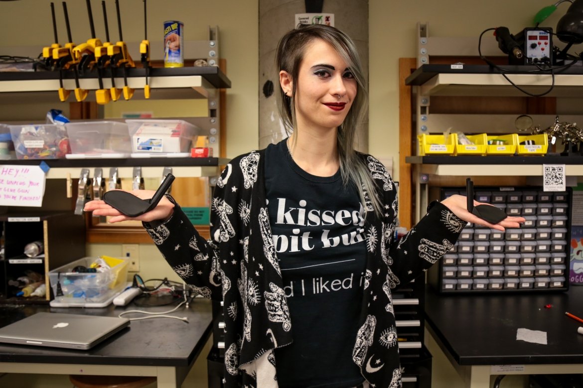 Stella Elwood holding her 3D printed duck splints in the College’s Makerspace