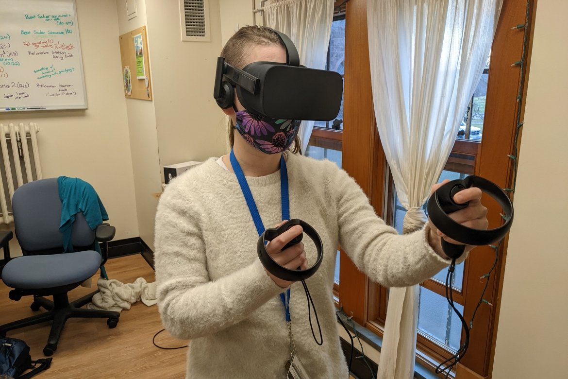 Stephanie Friedman, instructional technologist and specialist in emerging technologies for LITS, demonstrates the VR headset.