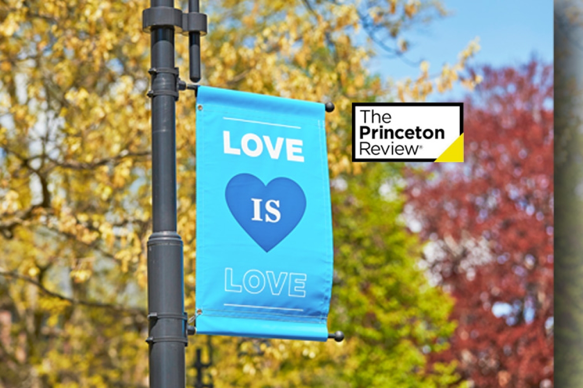 Banner for “Love is Love” on Mount Holyoke College’s campus with the Princeton Review logo in the lower right hand corner
