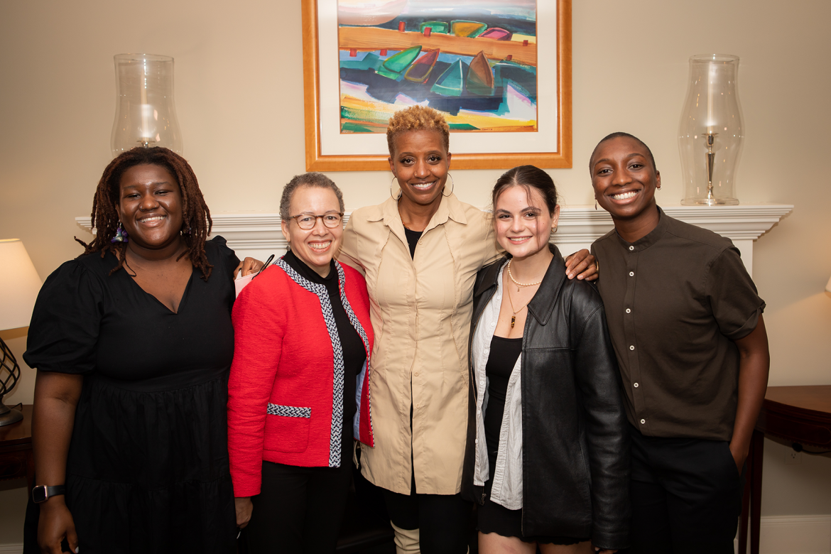 Tara Roberts ’91 (center) with Interim President Beverly Daniel Tatum and current MHC students
