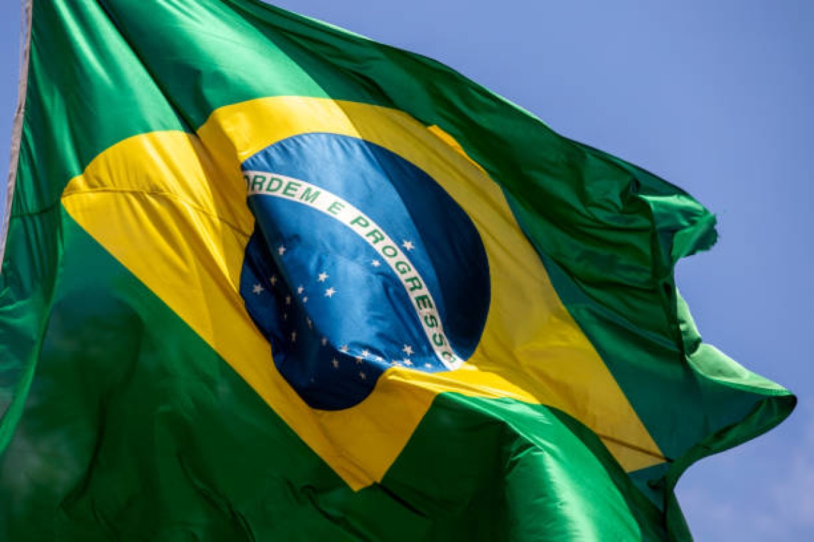 The Flag for Brazil waves in the wind