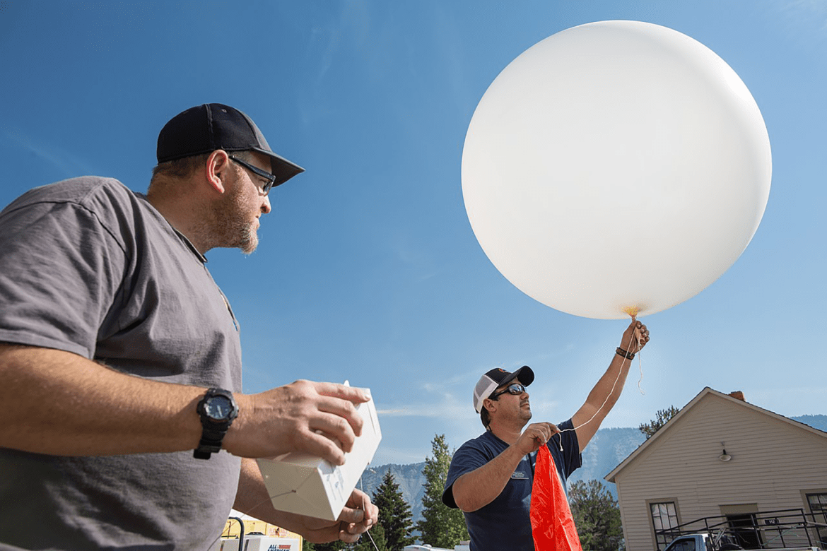 Launching a weather balloon at Mammoth Hot Springs