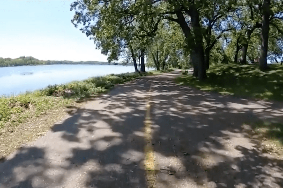 A two-lane bikepath near a waterway