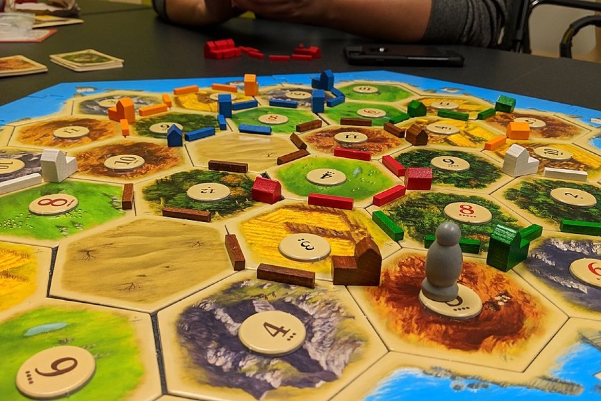 A game of Settlers of Catan. Courtesy of Yongho Kim via Wikimedia Commons.