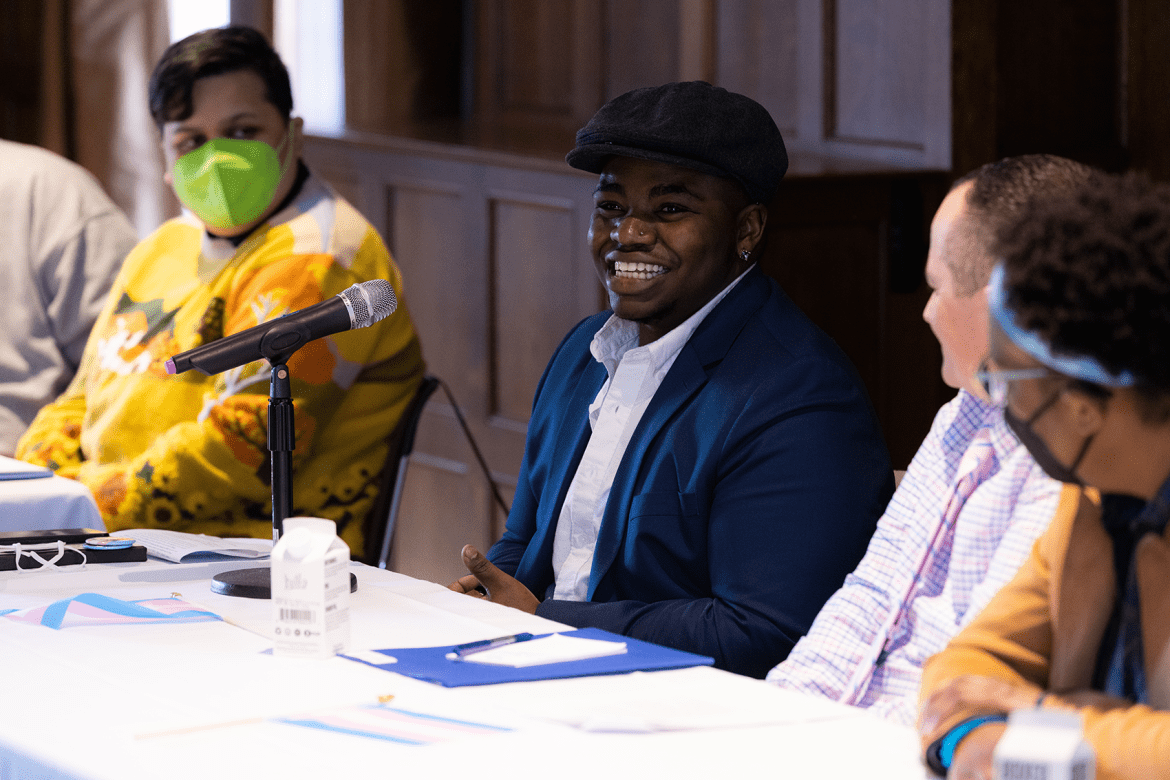 Malakai Chuckas ’20 smiling during a panel discussion at BOOM 2023