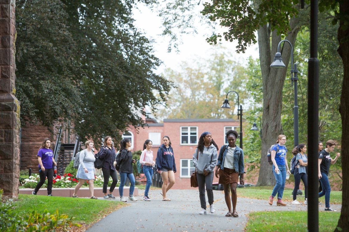 Students walking on the campus pathways. Photo by Ryan Donnell, 2017.
