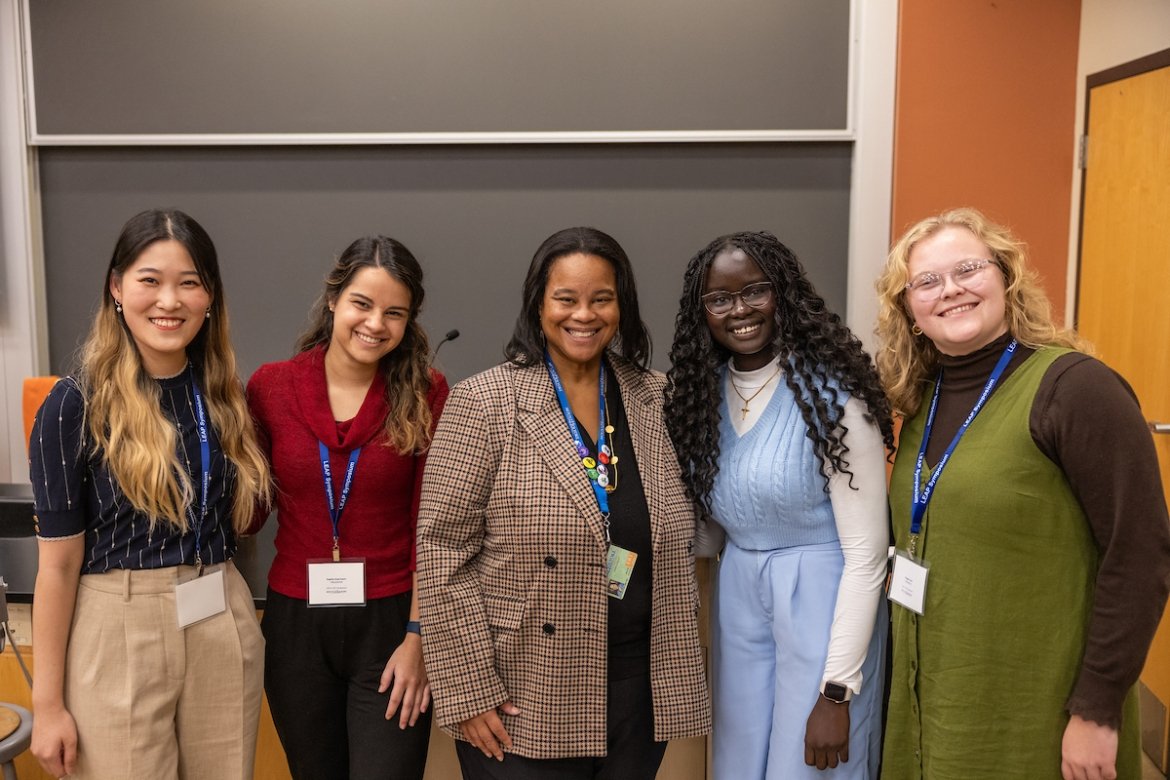 Students who presented at the LEAP Symposium pose for a photo with President Danielle R. Holley